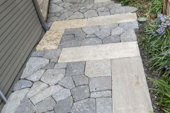 Basalt patio with limestone slabs