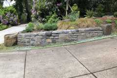 Basalt retaining wall, changing grade