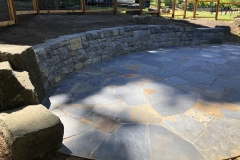 Basalt wall, slate patio.