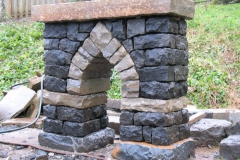 Freestanding Gothic arch.  Black basalt and sandstone