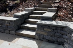 Basalt wall, bluestone cap, bluestone patio, basalt steps
