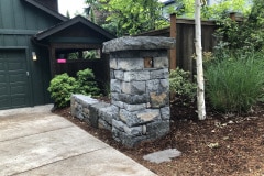 Basalt mailbox and wall