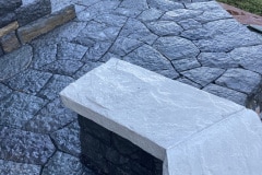 Basalt patio and walls, limestone cap